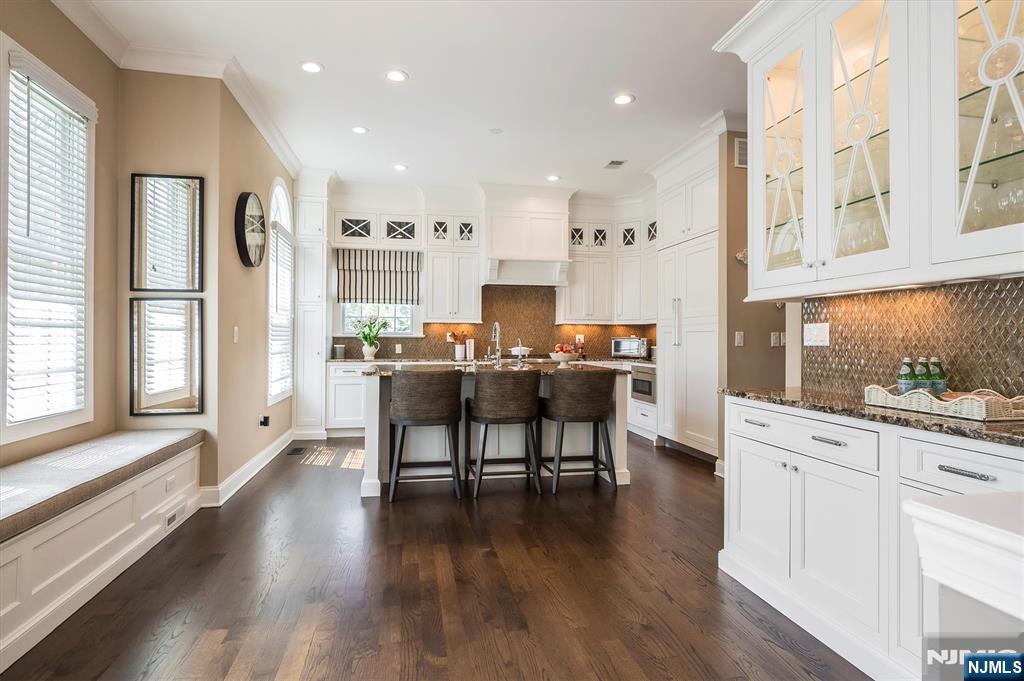 114 Harrison Avenue Montclair, NJ 07042 - Photo 11 of 41 a living room with stainless steel appliances kitchen island granite countertop furniture and a wooden floors