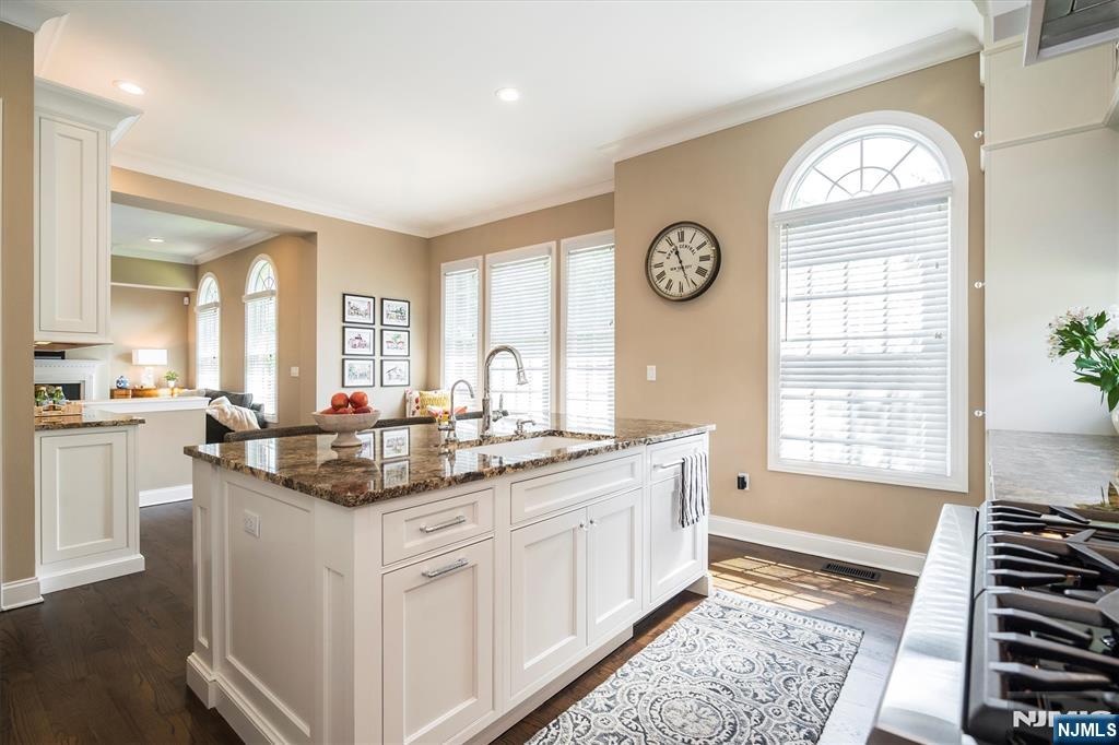 114 Harrison Avenue Montclair, NJ 07042 - Photo 15 of 41 a kitchen with cabinets and a large window