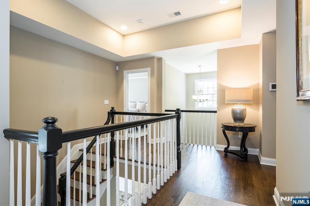 114 Harrison Avenue Montclair, NJ 07042 - Photo 21 of 41 a view of a hallway with a livingroom and furniture