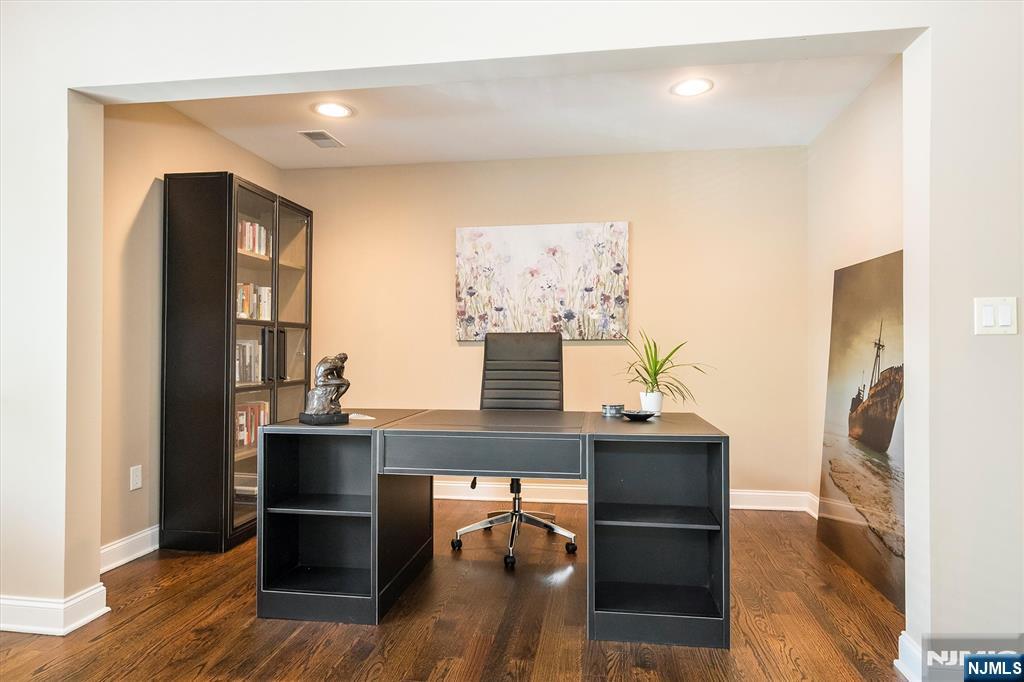 114 Harrison Avenue Montclair, NJ 07042 - Photo 24 of 41 a view of a workspace with furniture and wooden floor