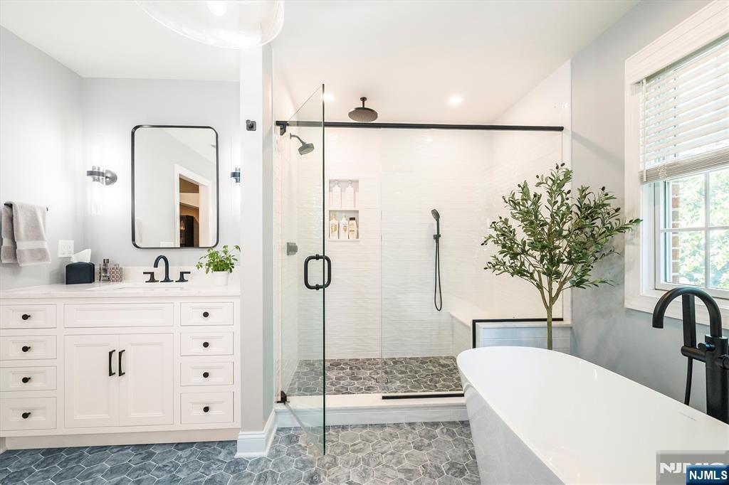 114 Harrison Avenue Montclair, NJ 07042 - Photo 27 of 41 a bathroom with a double vanity sink mirror and shower