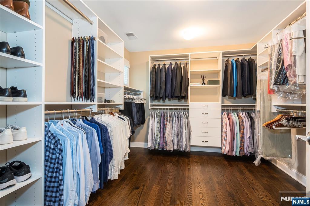114 Harrison Avenue Montclair, NJ 07042 - Photo 28 of 41 a view of walk in closet with clothes and shoes