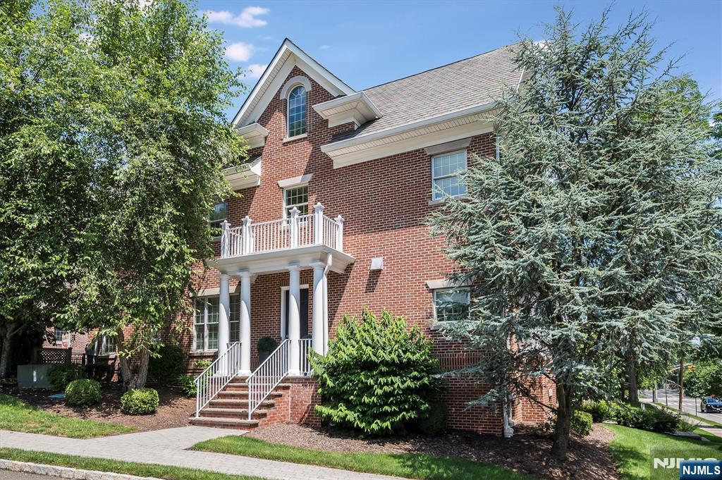 114 Harrison Avenue Montclair, NJ 07042 - Photo 3 of 41 front view of a house with a tree