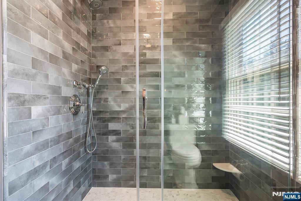 114 Harrison Avenue Montclair, NJ 07042 - Photo 35 of 41 a bathroom with a shower