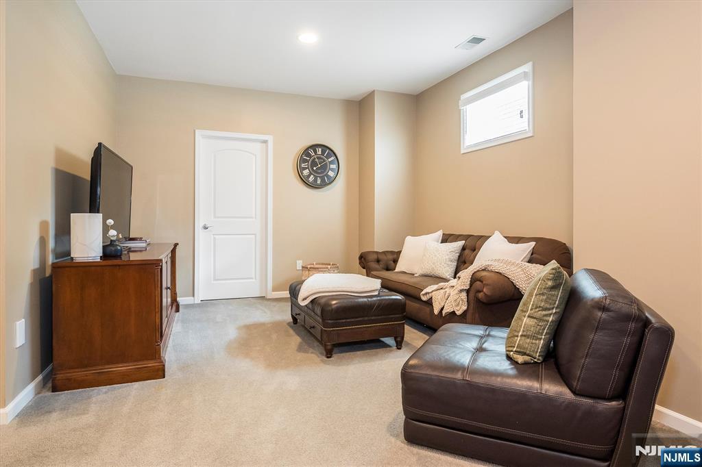114 Harrison Avenue Montclair, NJ 07042 - Photo 37 of 41 a living room with furniture