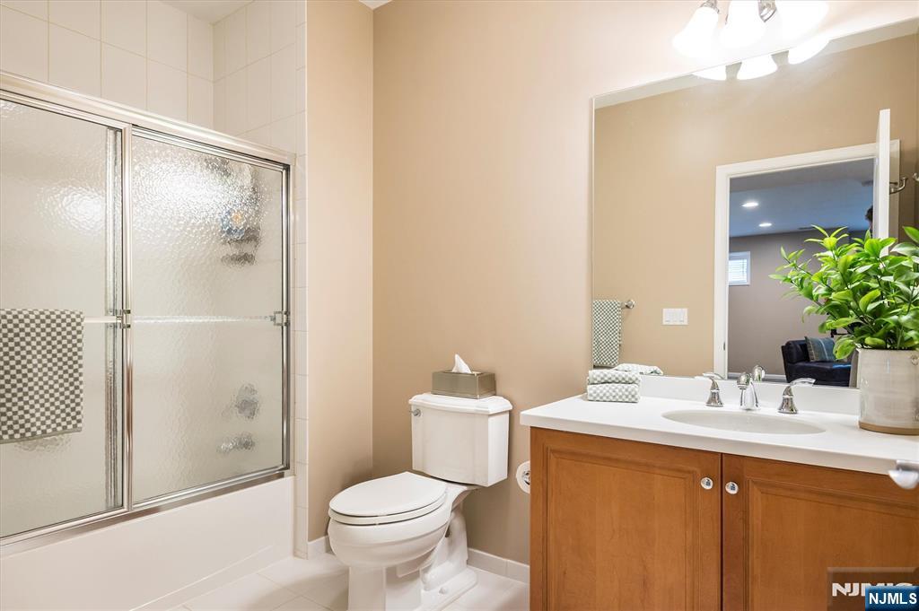 114 Harrison Avenue Montclair, NJ 07042 - Photo 38 of 41 a bathroom with a sink toilet and shower