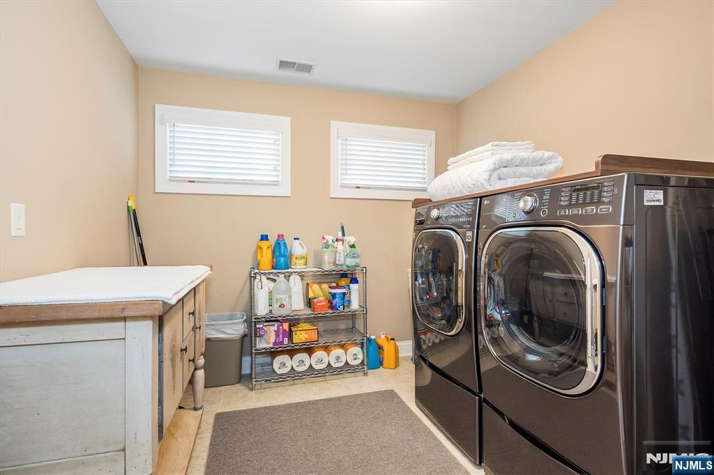 114 Harrison Avenue Montclair, NJ 07042 - Photo 39 of 41 a utility room with dryer and washer