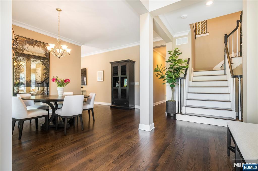 114 Harrison Avenue Montclair, NJ 07042 - Photo 6 of 41 a dining room with furniture entryway and wooden floor
