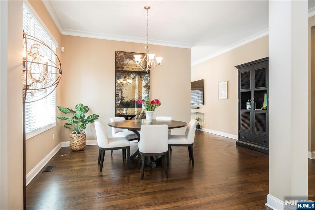 114 Harrison Avenue Montclair, NJ 07042 - Photo 7 of 41 a view of a dining room with furniture window and wooden floor