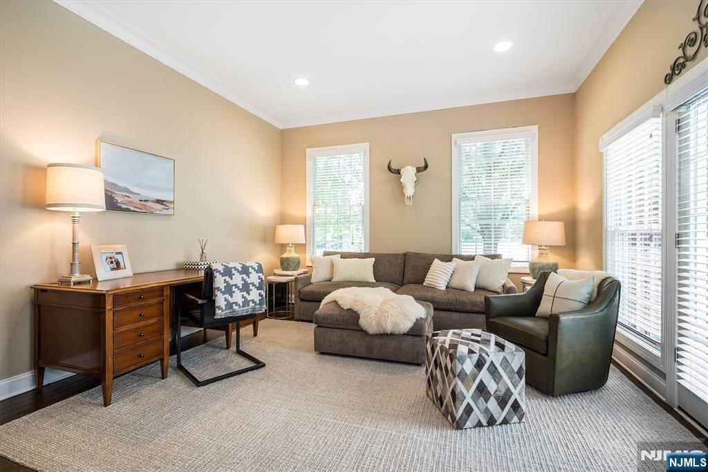 114 Harrison Avenue Montclair, NJ 07042 - Photo 10 of 41 a living room with furniture lamp and a large window