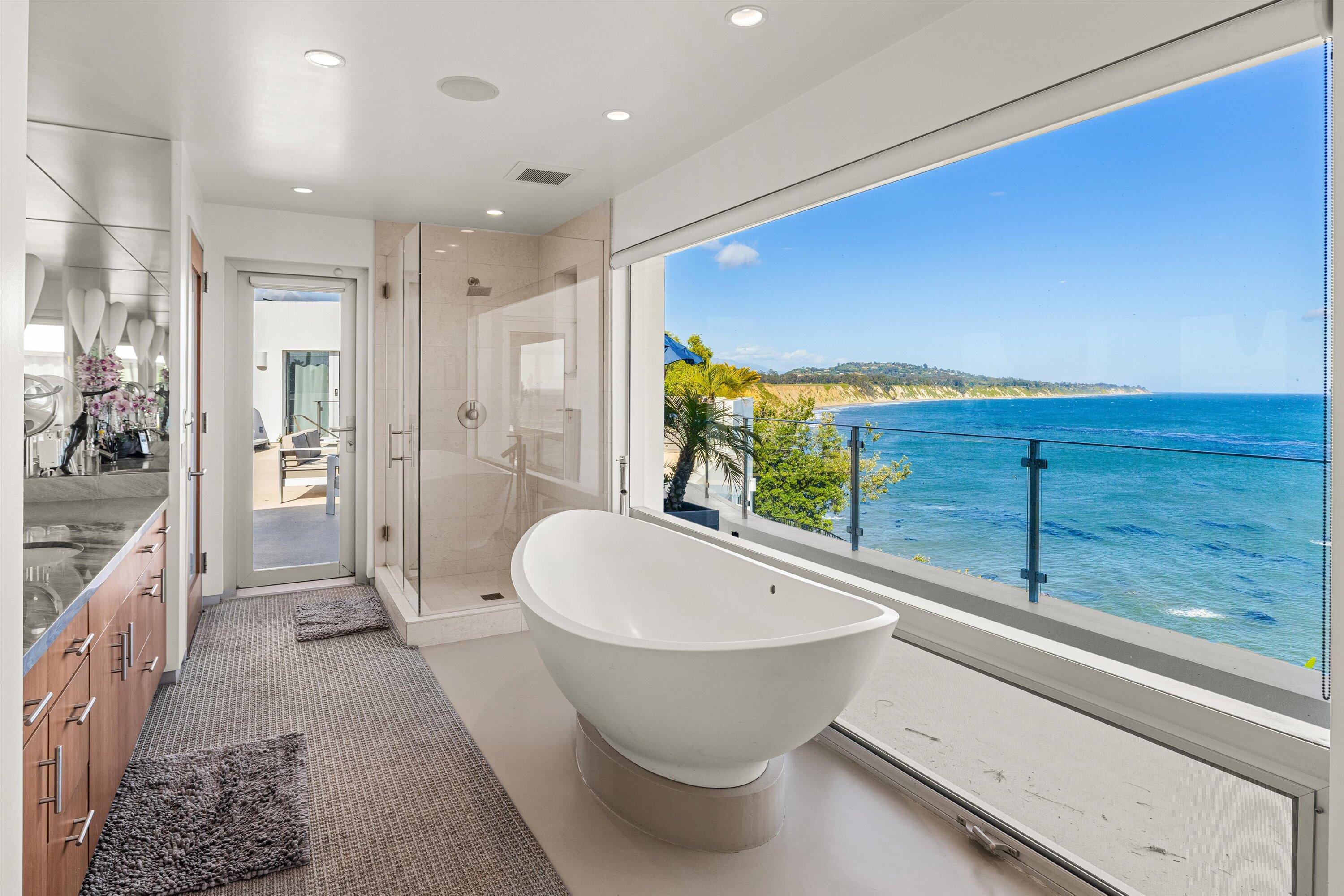 5297 Austin Road Santa Barbara, CA 93111 - Photo 17 of 35 a bathroom with a sink and mirror