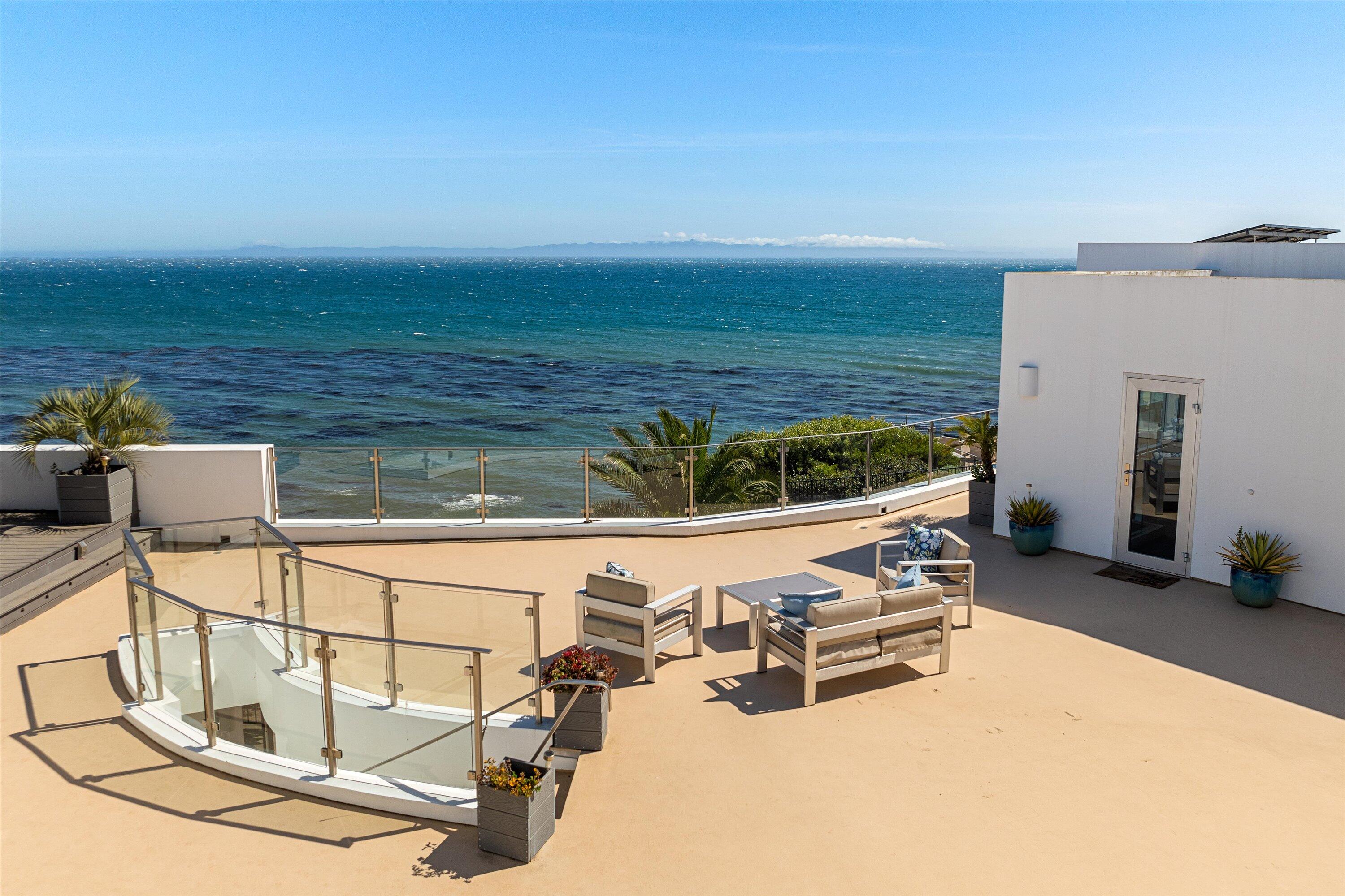 5297 Austin Road Santa Barbara, CA 93111 - Photo 20 of 35 a view of a swimming pool with an outdoor seating and a yard