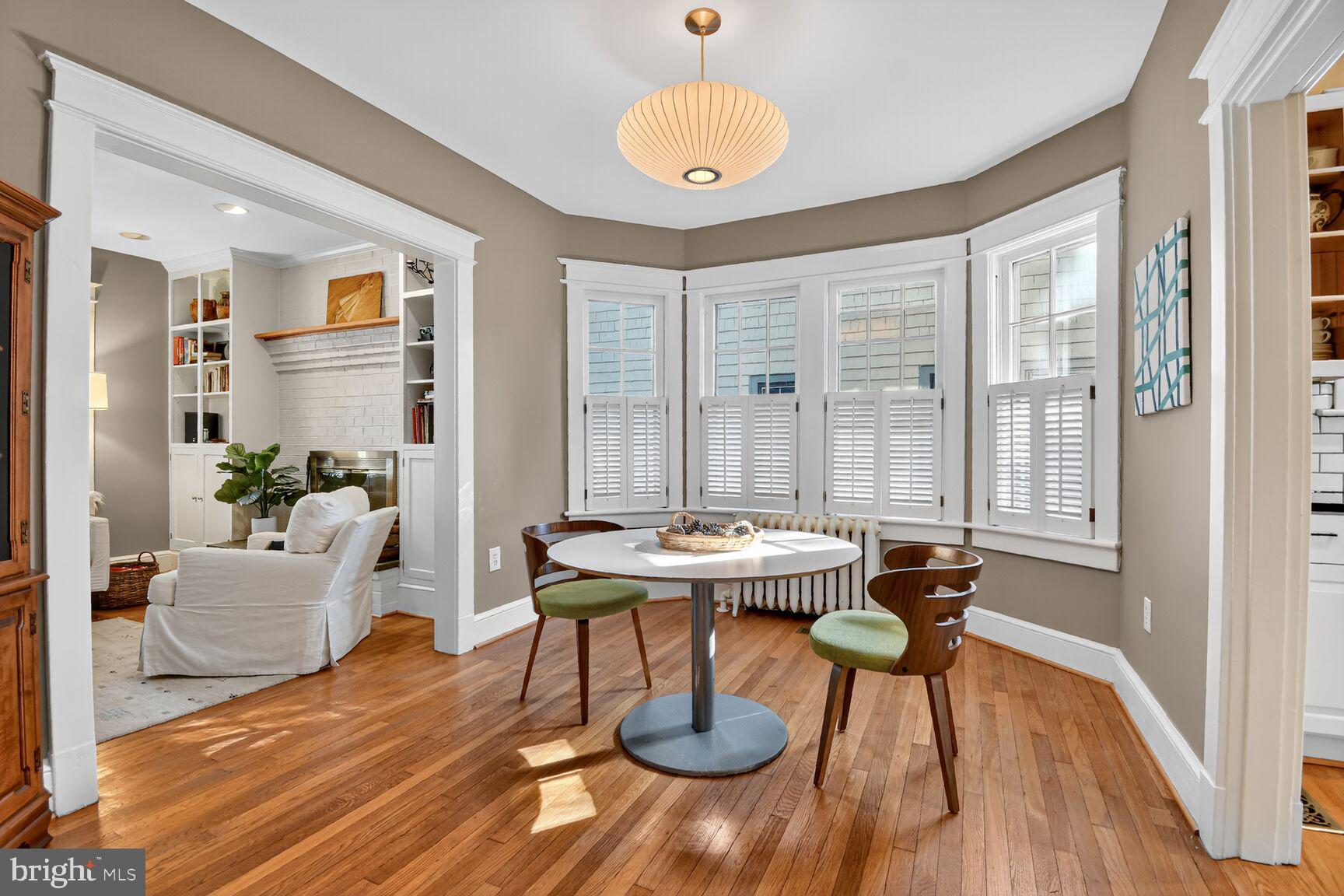 14 Cleveland Avenue Takoma Park, MD 20912 - Photo 11 of 41 a view of a dining room with furniture window and wooden floor