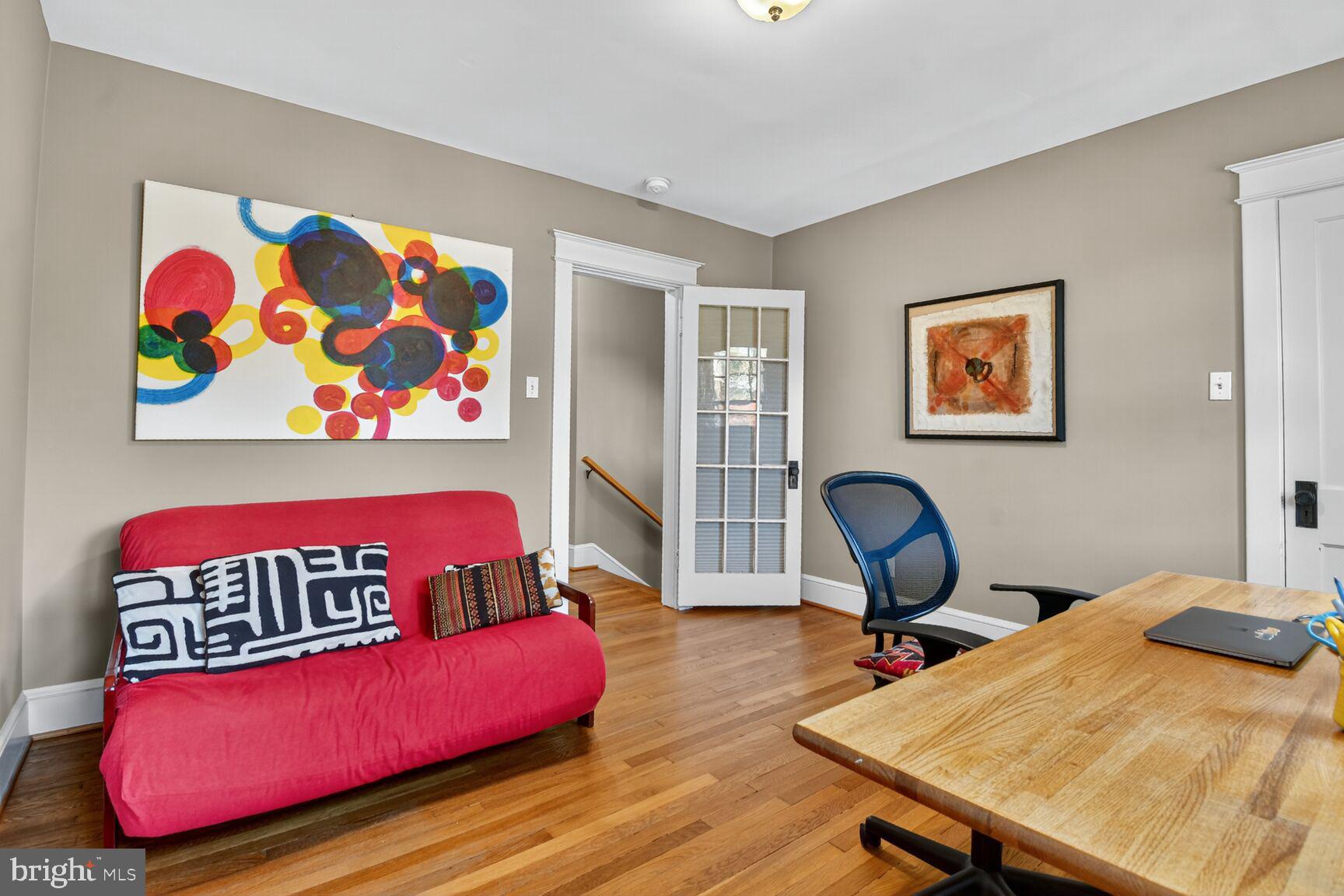 14 Cleveland Avenue Takoma Park, MD 20912 - Photo 25 of 41 a view of a workspace with furniture and wooden floor