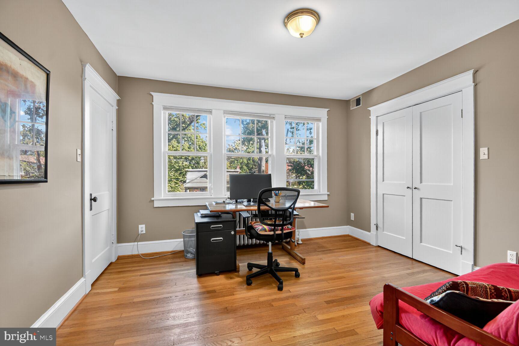 14 Cleveland Avenue Takoma Park, MD 20912 - Photo 26 of 41 a living room with furniture and a large window