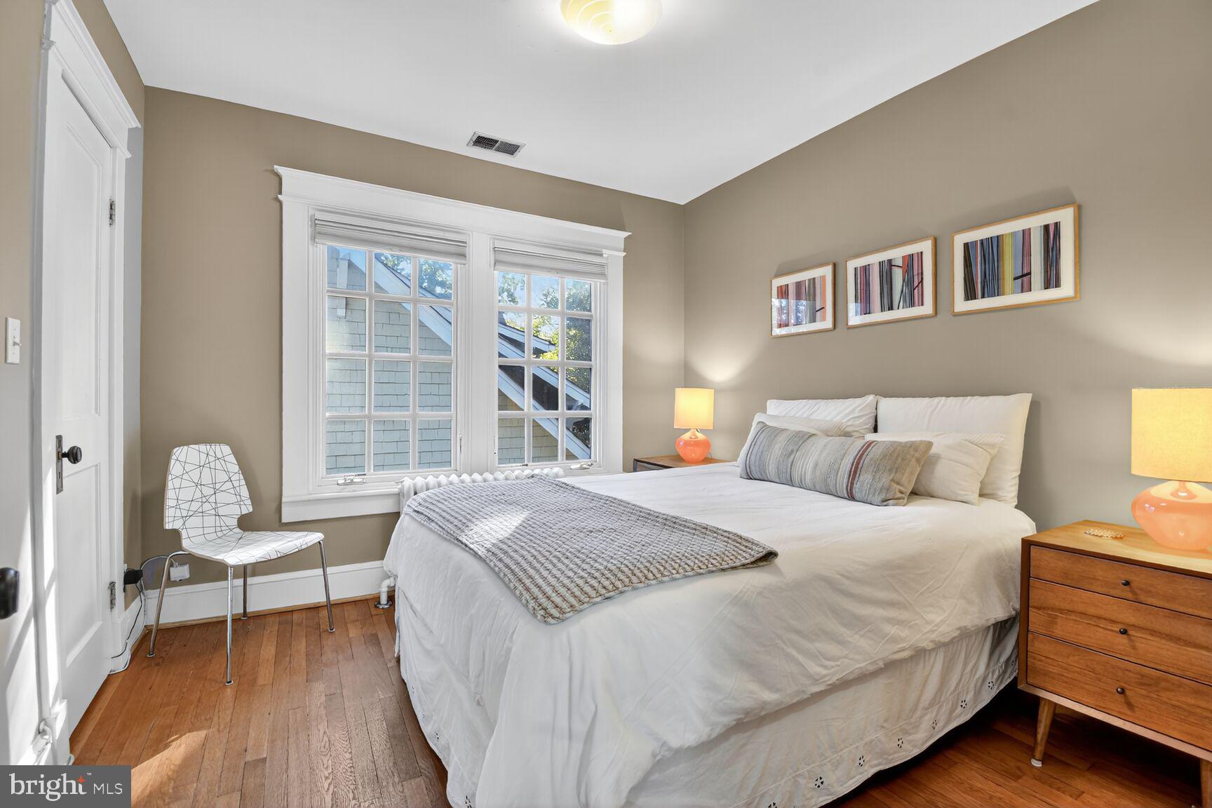 14 Cleveland Avenue Takoma Park, MD 20912 - Photo 27 of 41 a bedroom with a bed and a large window