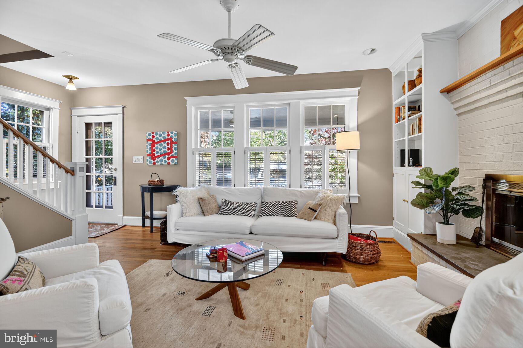 14 Cleveland Avenue Takoma Park, MD 20912 - Photo 7 of 41 a living room with furniture and a large window