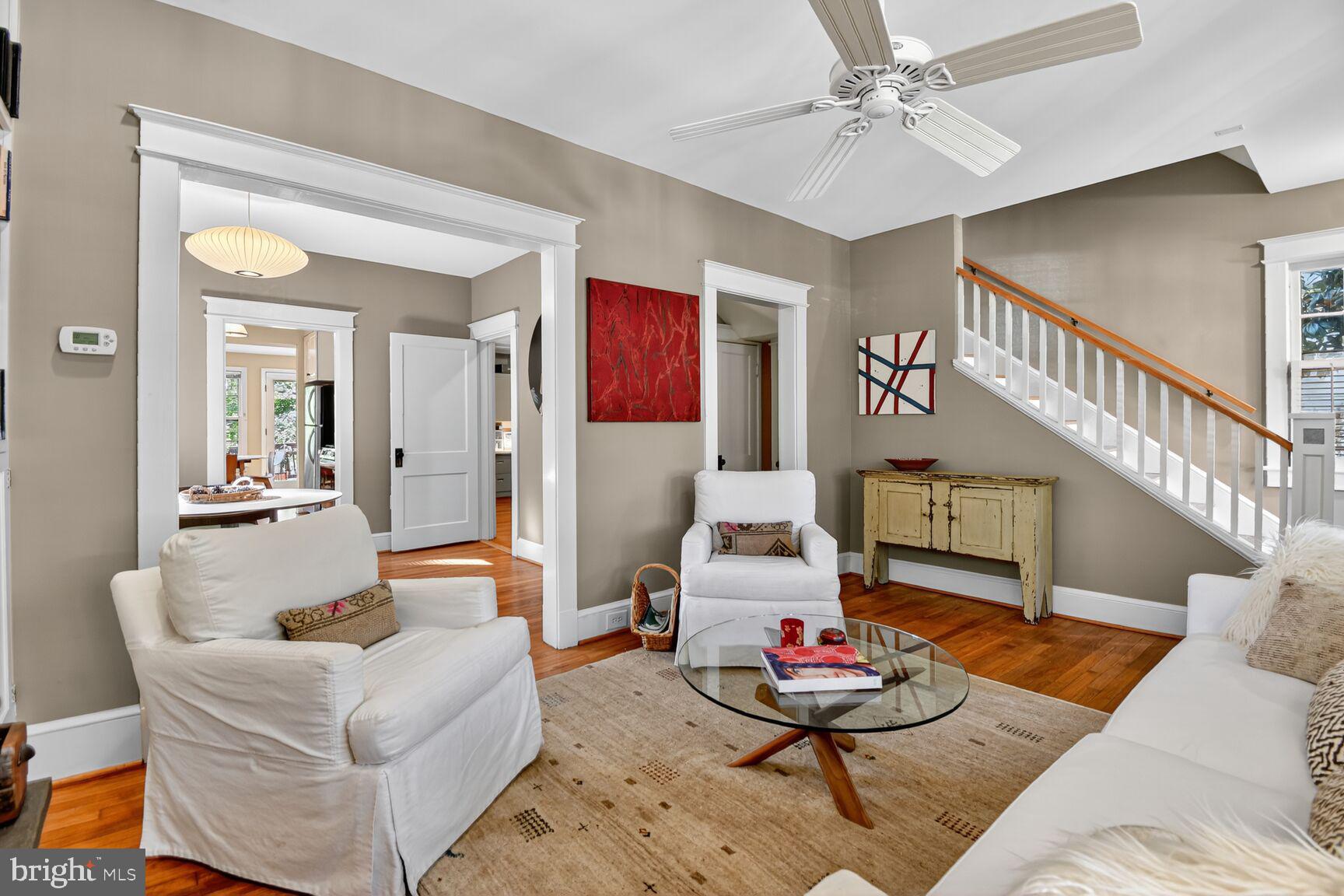 14 Cleveland Avenue Takoma Park, MD 20912 - Photo 9 of 41 a living room with furniture and a wooden floor