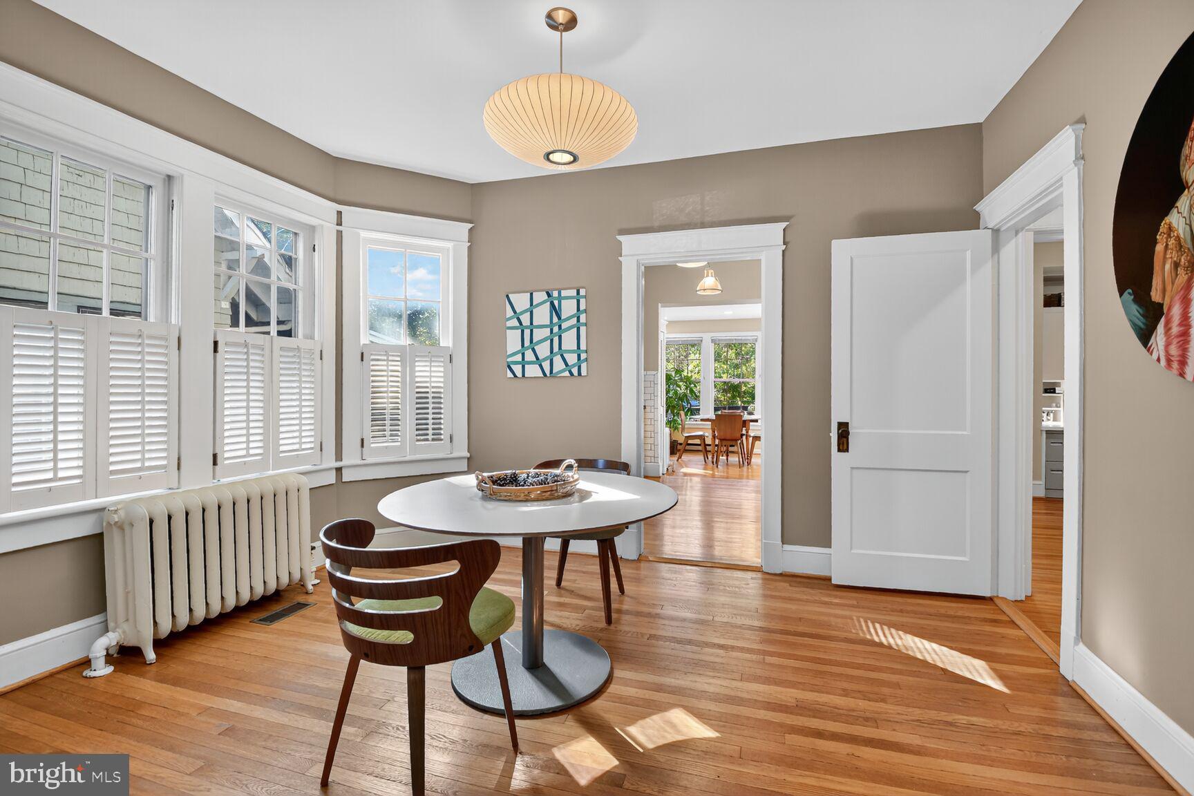 14 Cleveland Avenue Takoma Park, MD 20912 - Photo 10 of 41 a view of a dining room with furniture window and wooden floor