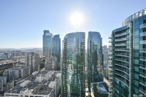 a view of a city with tall buildings