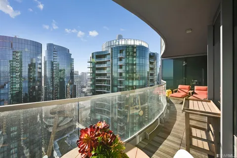 a view of balcony with a potted plant