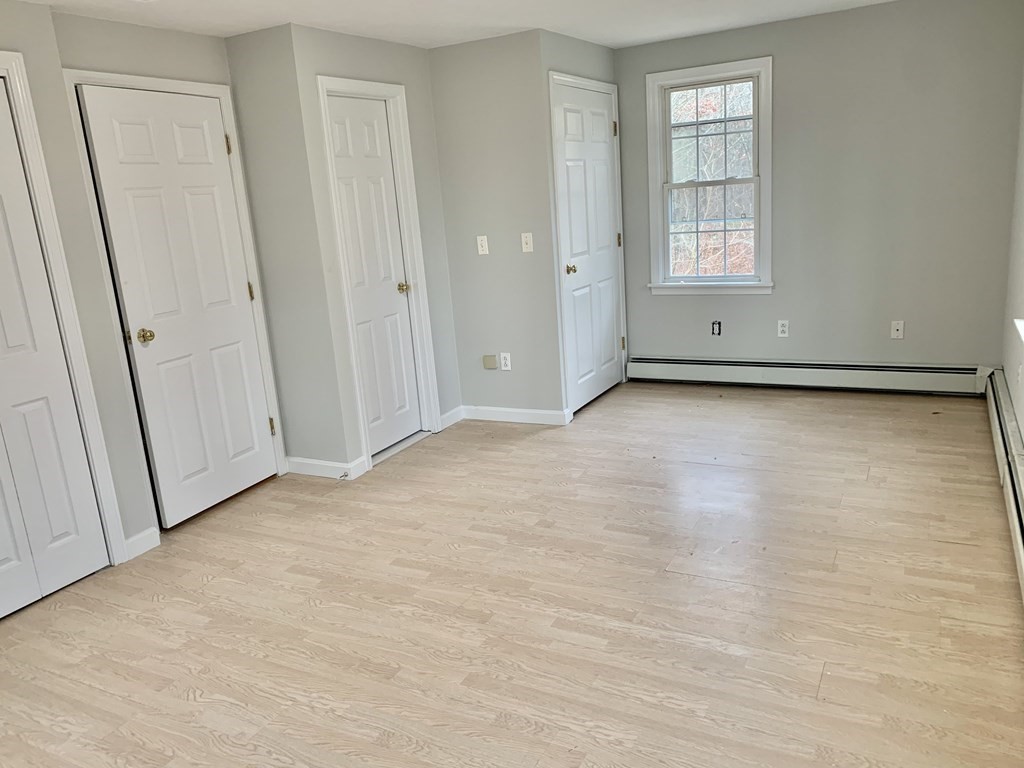 76 Old Douglas Road Webster, MA 01570 - Photo 13 of 22 an empty room with windows