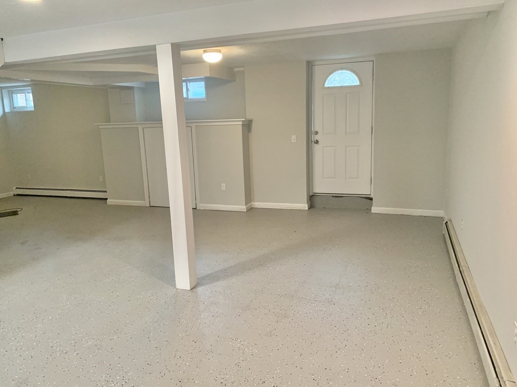 76 Old Douglas Road Webster, MA 01570 - Photo 19 of 22 an empty room with closet and mirror