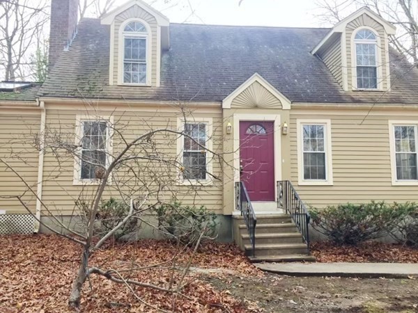 76 Old Douglas Road Webster, MA 01570 - Photo 22 of 22 a front view of a house with a yard