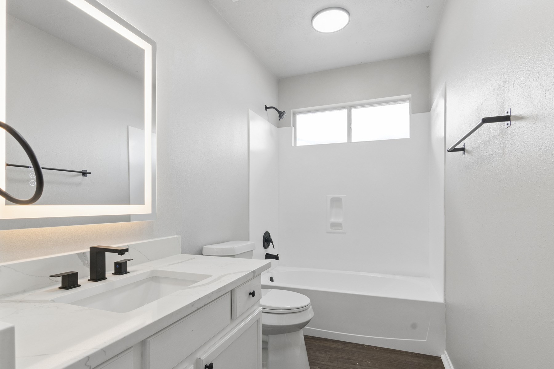 14211 Brunswick Point Lane Houston, TX 77047 - Photo 11 of 17 Secondary full bathroom with quartz countertops and LED mirror.