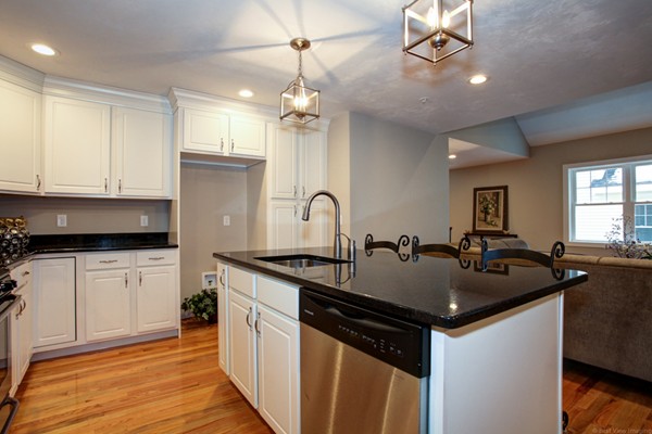 3 C Trail Ridge Way, Unit 7 Harvard, MA 01451 - Photo 12 of 30 a kitchen with granite countertop a sink a counter space appliances and cabinets