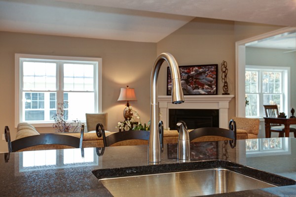 3 C Trail Ridge Way, Unit 7 Harvard, MA 01451 - Photo 13 of 30 a living room with furniture and a fireplace