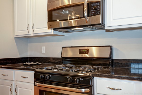 3 C Trail Ridge Way, Unit 7 Harvard, MA 01451 - Photo 14 of 30 a stove top oven sitting inside of a kitchen