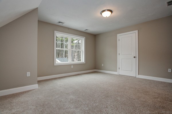 3 C Trail Ridge Way, Unit 7 Harvard, MA 01451 - Photo 24 of 30 an empty room with windows and closet
