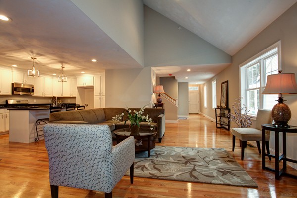 3 C Trail Ridge Way, Unit 7 Harvard, MA 01451 - Photo 8 of 30 a living room with furniture and kitchen view