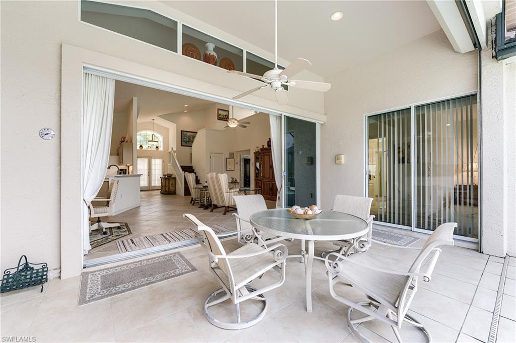 9156 Spring Run Boulevard Estero, FL 34135 - Photo 23 of 34 a living room with furniture