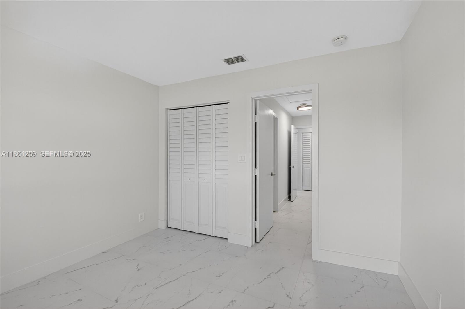 8840 Rheims Road Boca Raton, FL 33496 - Photo 14 of 41 a view of an empty room