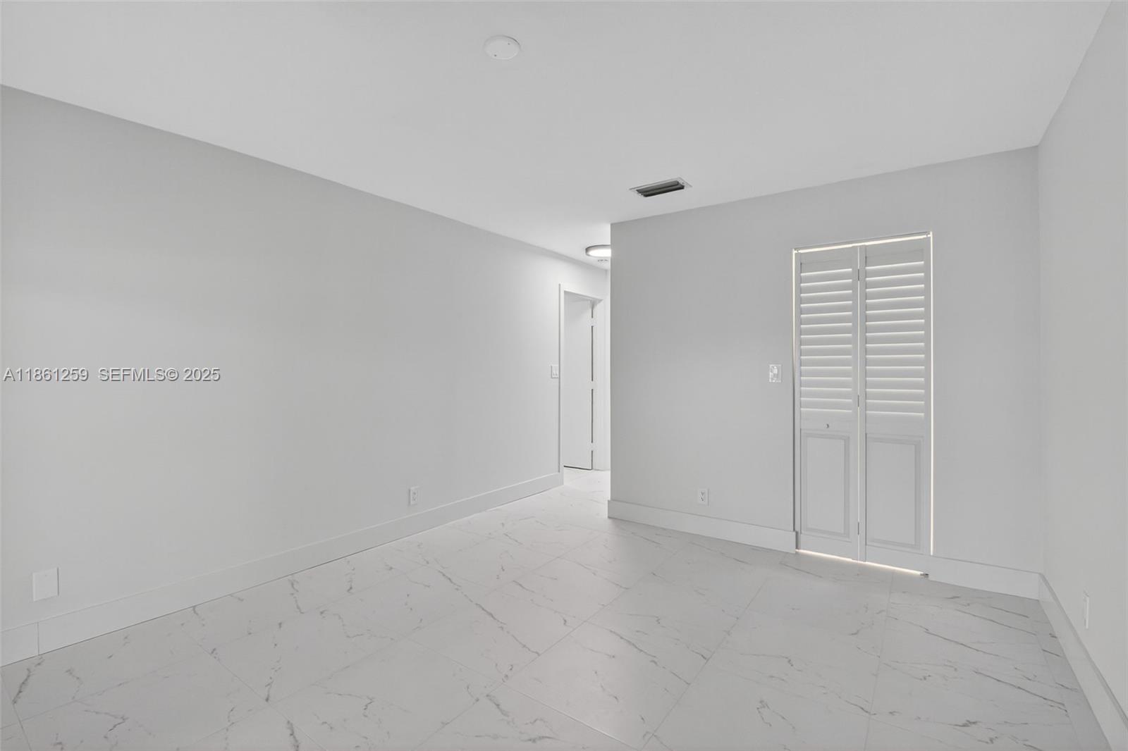 8840 Rheims Road Boca Raton, FL 33496 - Photo 18 of 41 a view of an empty room