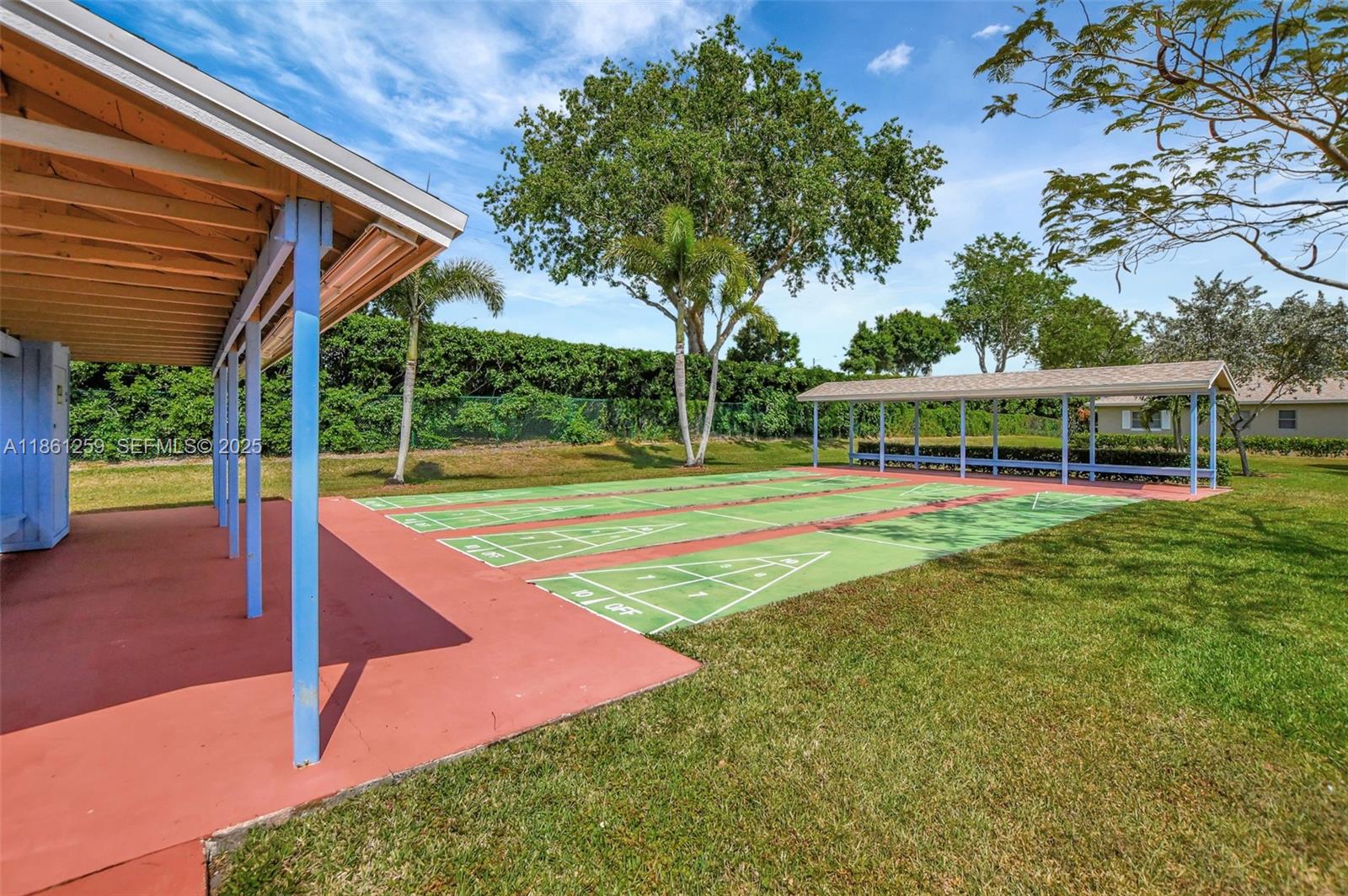 8840 Rheims Road Boca Raton, FL 33496 - Photo 31 of 41 a view of a house with swimming pool