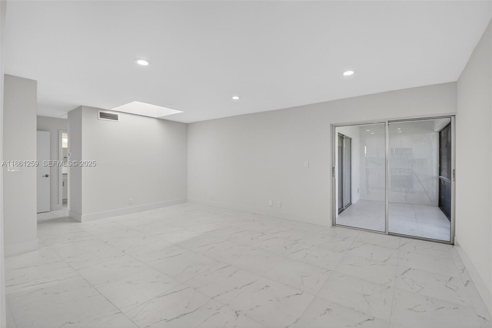 8840 Rheims Road Boca Raton, FL 33496 - Photo 10 of 41 a view of an empty room