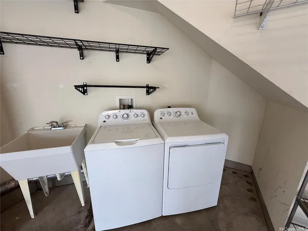 a utility room with dryer and washer