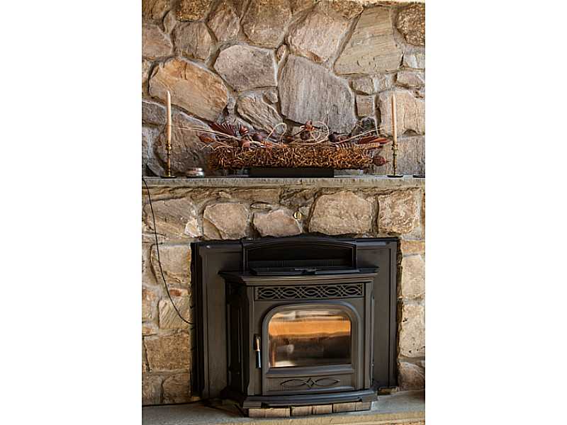 22 Winsor Road Foster, RI 02825 - Photo 7 of 25 Other. FIREPLACE WITH PELLET STOVE INSERT