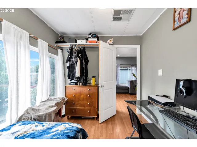 a view of a living room and bathroom