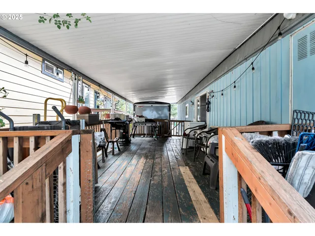 a open kitchen with wooden floor