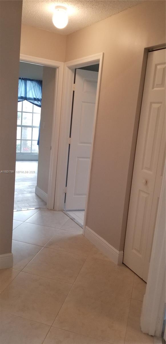 1972 Oak Berry Circle, Unit 1972 Wellington, FL 33414 - Photo 11 of 13 an empty room with windows