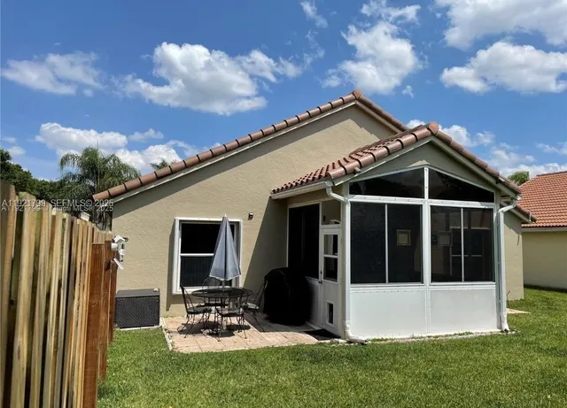 a view of a back yard of the house