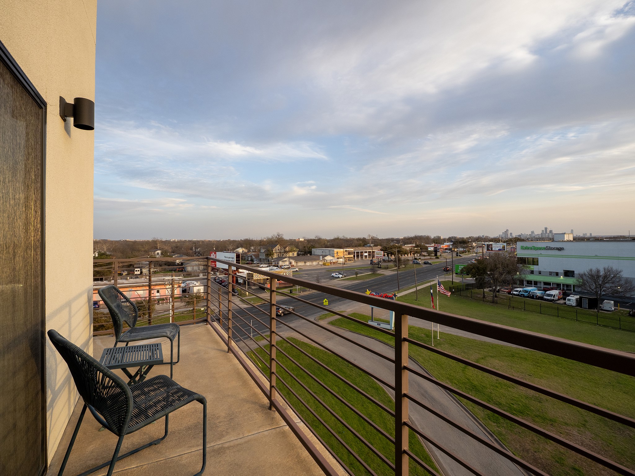 6444 Burnet Road, Unit 509 Austin, TX 78757 - Photo 22 of 32 Unwind on this peaceful balcony with views of the city skyline and surrounding neighborhood.