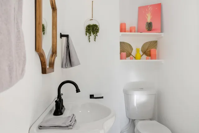 a view of a livingroom with furniture and a fireplace