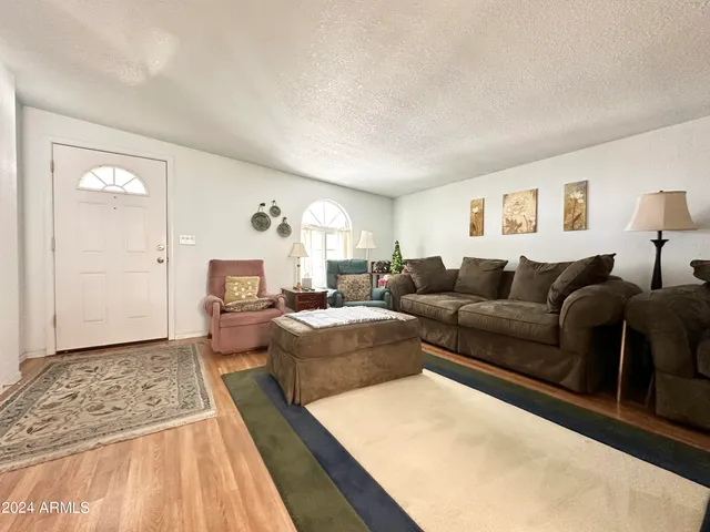a living room with furniture and a couch