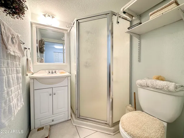 a kitchen that has a table chairs and wooden floor