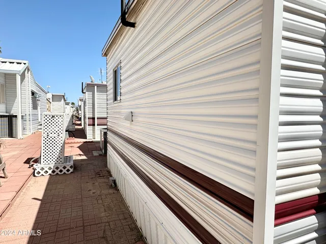a view of swimming pool with outdoor seating